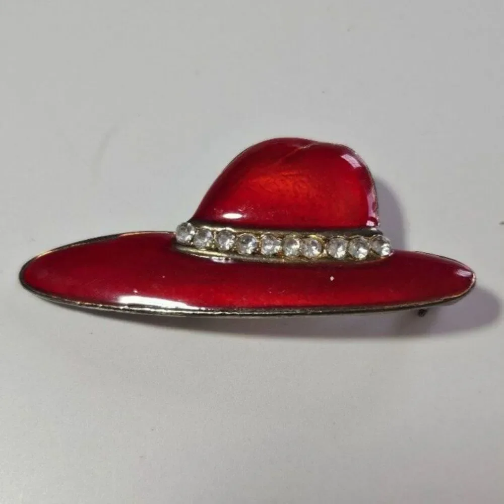 Gold tone red hat society brooch